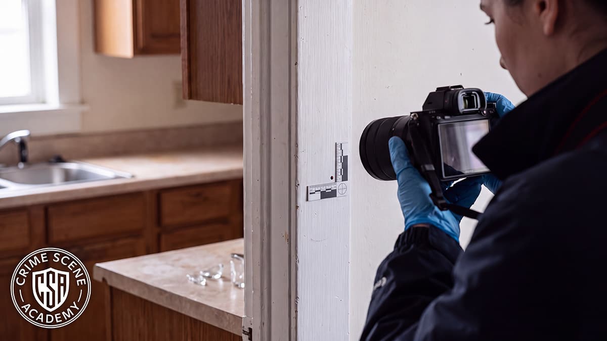 Crime scene evidence documented in place, where context and collection decisions can determine later investigative value.